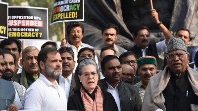 Congress Parliamentary Party Chairperson Sonia Gandhi, party President Mallikarjun Kharge, and party MP Rahul Gandhi join the protest of MPs in front of the Gandhi statue against the suspension of 143 Opposition MP. (ANI) Congress Parliamentary Party Chairperson Sonia Gandhi, party President Mallikarjun Kharge, and party MP Rahul Gandhi join the protest of MPs in front of the Gandhi statue against the suspension of 143 Opposition MP. (ANI)