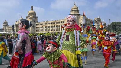 Folk artistes take part in a procession during the inauguration of the 'Namma Jatre' programme at Vidhana Soudha in Bengaluru on December 10. (PTI/File) Folk artistes take part in a procession during the inauguration of the 'Namma Jatre' programme at Vidhana Soudha in Bengaluru on December 10. (PTI/File)