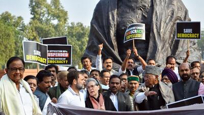 Opposition parties protest near Gandhi statue on Wednesday. (ANI) Opposition parties protest near Gandhi statue on Wednesday. (ANI)