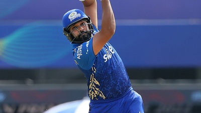 Rohit Sharma of Mumbai Indians hits over the top for six, during the second T20 cricket match of the Indian Premier League 2022 (PTI) Rohit Sharma of Mumbai Indians hits over the top for six, during the second T20 cricket match of the Indian Premier League 2022 (PTI)