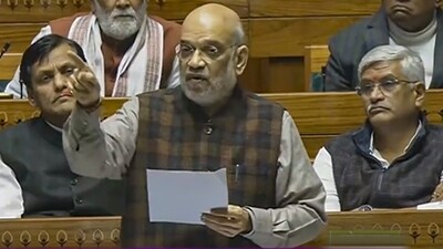 Union Home Minister Amit Shah speaks in the Lok Sabha during the Winter session of Parliament, in New Delhi. (PTI)