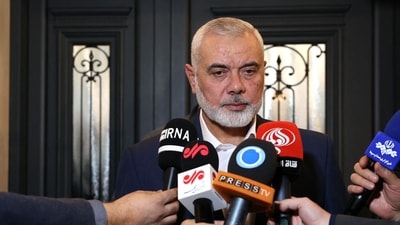 Israel-Hamas War: Qatar-based Hamas leader Ismail Haniyeh speaking to journalists. (AFP) Israel-Hamas War: Qatar-based Hamas leader Ismail Haniyeh speaking to journalists. (AFP)