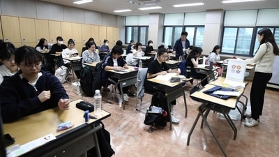 South Korean students wait to take the annual College Scholastic Ability Test, known locally as Suneung, at a school in Seoul (Representational picture) (AFP) South Korean students wait to take the annual College Scholastic Ability Test, known locally as Suneung, at a school in Seoul (Representational picture) (AFP)