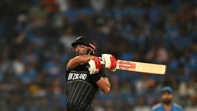 Daryl Mitchell plays a shot during the 2023 ICC Men's Cricket World Cup one-day international (ODI) first semi-final match between India and New Zealand (AFP) Daryl Mitchell plays a shot during the 2023 ICC Men's Cricket World Cup one-day international (ODI) first semi-final match between India and New Zealand (AFP)