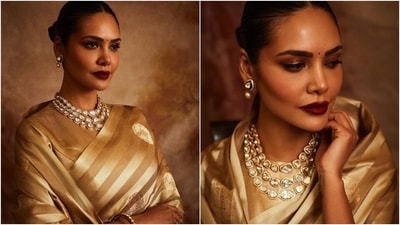 Earlier, Esha had posted pictures of another photoshoot for which she chose a gold silk saree featuring a striped design and gold brocade embroidery. She wore the saree in traditional drape, letting the pallu fall in a floor-sweeping length. A matching gold silk blouse with half-length sleeves and a round neckline added a finishing touch. (Instagram) Earlier, Esha had posted pictures of another photoshoot for which she chose a gold silk saree featuring a striped design and gold brocade embroidery. She wore the saree in traditional drape, letting the pallu fall in a floor-sweeping length. A matching gold silk blouse with half-length sleeves and a round neckline added a finishing touch. (Instagram)