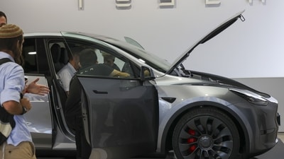 A Tesla Model Y electric vehicle (EV). (Representative Image/Bloomberg) A Tesla Model Y electric vehicle (EV). (Representative Image/Bloomberg)