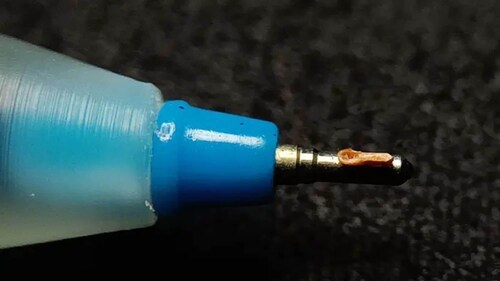 The image shows the world's smallest wooden spoon, created by Sashikant Prajapati, on the nib of a pen. (Guinness World Records) The image shows the world's smallest wooden spoon, created by Sashikant Prajapati, on the nib of a pen. (Guinness World Records)