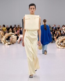 A model in sparkly ballet flats from the Loewe spring/summer 2024 show A model in sparkly ballet flats from the Loewe spring/summer 2024 show