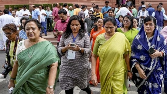 Union minister Shobha Karandlaje (centre in green) with other BJP women MPs