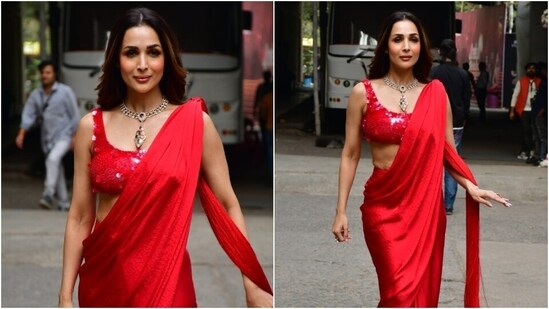 Malaika Arora in a sizzling red thigh-slit saree serves a glamorous look for brides-to-be. (HT Photo/Varinder Chawla)