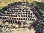 An aerial view of the mass burial ceremony of Kuki-Zo victims of Manipur’s ethnic conflict. The burial took place in Churachandpur on Wednesday. (Sourced) An aerial view of the mass burial ceremony of Kuki-Zo victims of Manipur’s ethnic conflict. The burial took place in Churachandpur on Wednesday. (Sourced)
