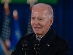 US President Joe Biden speaks at an economic event at the Wisconsin Black Chamber of Commerce in Milwaukee, Wisconsin, US, on Wednesday, Dec. 20, 2023. Biden said it is self-evident that Donald Trump is an insurrectionist but declined to endorse a Colorado Supreme Court decision that would bar the Republican presidential frontrunner from appearing on the ballot in that state. 