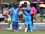 India's Sanju Samson celebrates his century with Rinku Singh.
