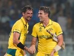 Australia's captain Pat Cummins (R) and Mitchell Starc celebrate Australia's captain Pat Cummins (R) and Mitchell Starc celebrate