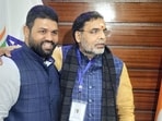 Wrestling Federation of India (WFI) presidential candidate Sanjay Singh (right) on the day of WFI elections