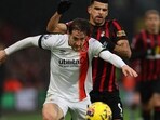 Luton Town's Tom Lockyer in action with AFC Bournemouth's Dominic Solanke 