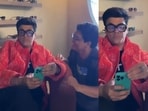 Karan Johar keeps on using his phone as Tanmay Bhat sings viral Inky Pinky Ponky song for him. Karan Johar keeps on using his phone as Tanmay Bhat sings viral Inky Pinky Ponky song for him.