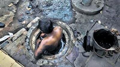 SC eradicates manual scavenging: On October 20, the Supreme Court ruled that government authorities would have to pay <span class='webrupee'>₹</span>30 lakh as compensation to the kin of individuals who die while cleaning sewers. Additionally, those who suffer permanent disabilities while engaged in this work will receive a minimum compensation of <span class='webrupee'>₹</span>20 lakh. The bench emphasized that the Union and state governments must take measures to completely eradicate manual scavenging. (File Photo) SC eradicates manual scavenging: On October 20, the Supreme Court ruled that government authorities would have to pay <span class='webrupee'>₹</span>30 lakh as compensation to the kin of individuals who die while cleaning sewers. Additionally, those who suffer permanent disabilities while engaged in this work will receive a minimum compensation of <span class='webrupee'>₹</span>20 lakh. The bench emphasized that the Union and state governments must take measures to completely eradicate manual scavenging. (File Photo)