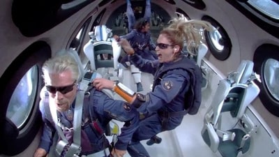 Virgin Galactic takes first space tourists on successful flight: On August 11, a Virgin Galactic rocket carried its first space tourists to the edge of space, including a former British Olympian who purchased his ticket 18 years ago and a mother-daughter duo from the Caribbean. (REUTERS) Virgin Galactic takes first space tourists on successful flight: On August 11, a Virgin Galactic rocket carried its first space tourists to the edge of space, including a former British Olympian who purchased his ticket 18 years ago and a mother-daughter duo from the Caribbean. (REUTERS)