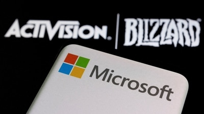 Microsoft logo is seen on a smartphone placed on displayed Activision Blizzard logo in this illustration taken January 18, 2022. (REUTERS/Dado Ruvic/Illustration//File Photo)