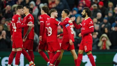 Liverpool's Mohamed Salah, right, is congratulated after scoring his side's 4th goal during the English League Cup quarterfinal (AP) Liverpool's Mohamed Salah, right, is congratulated after scoring his side's 4th goal during the English League Cup quarterfinal (AP)