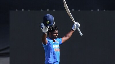 India's Sanju Samson celebrates his century during the third one-day international (ODI) cricket match between South Africa and India (AFP) India's Sanju Samson celebrates his century during the third one-day international (ODI) cricket match between South Africa and India (AFP)