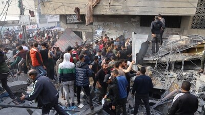 Palestinians search a building destroyed by an Israeli airstrike near the Kuwaiti hospital in Rafah, southern Gaza. (Bloomberg) Palestinians search a building destroyed by an Israeli airstrike near the Kuwaiti hospital in Rafah, southern Gaza. (Bloomberg)