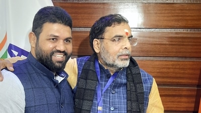 Wrestling Federation of India (WFI) presidential candidate Sanjay Singh (right) on the day of WFI elections (PTI)