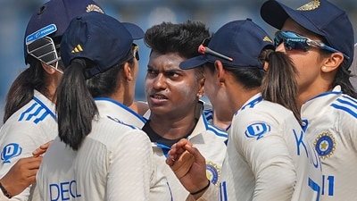 India's bowler Pooja Vastrakar celebrates the wicket of Australian batter Ashleigh Gardner during the first day of the one-off Test cricket match between India and Australia, in Mumbai, (PTI) India's bowler Pooja Vastrakar celebrates the wicket of Australian batter Ashleigh Gardner during the first day of the one-off Test cricket match between India and Australia, in Mumbai, (PTI)