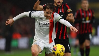 Luton Town's Tom Lockyer in action with AFC Bournemouth's Dominic Solanke (REUTERS)