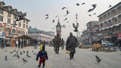 SC upholds abrogation of Article 370: A five-judge Constitution bench of the Supreme Court unanimously upheld the validity of the Union government's 2019 decision to abrogate Article 370 of the Constitution on December 11. The article had conferred special status on Jammu and Kashmir, with the bench emphasizing that Article 370 is a "temporary provision." (AFP) SC upholds abrogation of Article 370: A five-judge Constitution bench of the Supreme Court unanimously upheld the validity of the Union government's 2019 decision to abrogate Article 370 of the Constitution on December 11. The article had conferred special status on Jammu and Kashmir, with the bench emphasizing that Article 370 is a "temporary provision." (AFP)