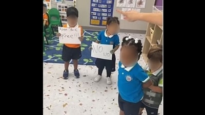A black girl, 2, was made to take part in aRosa Parks reenactment where a lighter-skinner child “handcuffed” her in front of her peers (NAACP/Facebook) A black girl, 2, was made to take part in aRosa Parks reenactment where a lighter-skinner child “handcuffed” her in front of her peers (NAACP/Facebook)