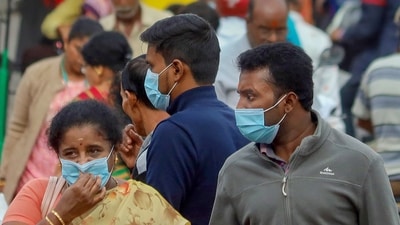 People wearing face masks as a precautionary measure after cases of COVID-19 sub-variant JN.1 were detected in the country. (PTI)