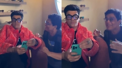Karan Johar keeps on using his phone as Tanmay Bhat sings viral Inky Pinky Ponky song for him. (Instagram/@tanmaybhat) Karan Johar keeps on using his phone as Tanmay Bhat sings viral Inky Pinky Ponky song for him. (Instagram/@tanmaybhat)