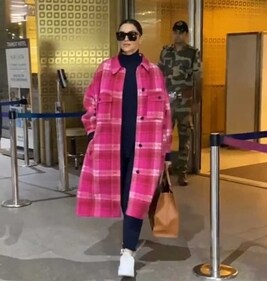 Deepika Padukone in a red and white print trench coat Deepika Padukone in a red and white print trench coat