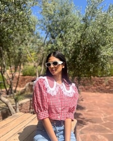 Malavika Mohanan in a red and white puffed sleeve top Malavika Mohanan in a red and white puffed sleeve top