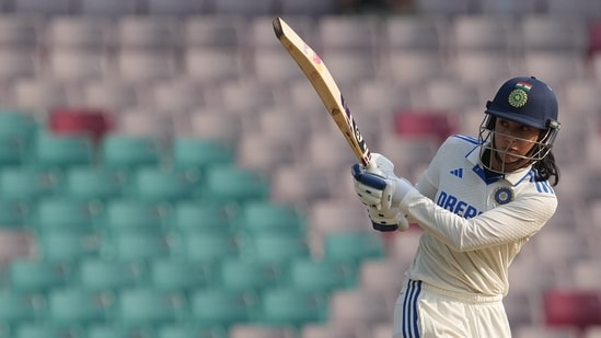 India Women vs Australia Women Highlights: India's Smriti Mandhana plays a shot. India Women vs Australia Women Highlights: India's Smriti Mandhana plays a shot.