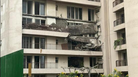 Three balconies located in another tower of the condominium collapsed on Sunday evening — the same tower which partially collapsed last year, resulting in the death of two women. (HT Photo)