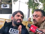 A combination of pictures shows the Padma Shri award that is placed on the pavement near Kartavya Path by wrestler Bajrang Punia as he speaks to the media on returning his award after former Wrestling Federation of India (WFI) 