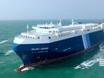  The Galaxy Leader cargo ship is escorted by Houthi boats in the Red Sea 