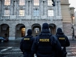 Members of the Police stand guard following a shooting at one of Charles University's buildings in Prague, Czech Republic. (Reuters)
