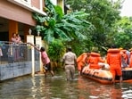 NDRF personnel distribute food and other items amid floods after heavy rainfall in the aftermath of Cyclone Michaung, in Chennai, Thursday, Dec. 7, 2023. (PTI Photo/ R Senthilkumar) 
