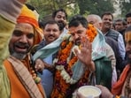 BJP MP Brij Bhushan Sharan Singh with supporters after UP Wrestling Association Vice President Sanjay Singh became the new President of the Wrestling Federation of India (WFI), in New Delhi