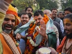 BJP MP Brij Bhushan Sharan Singh with supporters after UP Wrestling Association Vice President Sanjay Singh became the new President of the Wrestling Federation of India (WFI), in New Delhi BJP MP Brij Bhushan Sharan Singh with supporters after UP Wrestling Association Vice President Sanjay Singh became the new President of the Wrestling Federation of India (WFI), in New Delhi