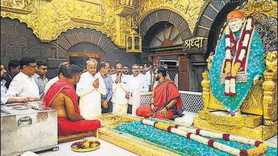 **EDS: IMAGE VIA @ashokgehlot51**Shirdi: Rajasthan Chief Minister Ashok Gehlot at the Sai Baba temple, in Shirdi, Friday, Sept. 23, 2022. (PTI Photo) (PTI09_23_2022_000182B) (PTI) **EDS: IMAGE VIA @ashokgehlot51**Shirdi: Rajasthan Chief Minister Ashok Gehlot at the Sai Baba temple, in Shirdi, Friday, Sept. 23, 2022. (PTI Photo) (PTI09_23_2022_000182B) (PTI)