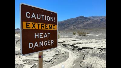 A sign board warns of extreme heat in Death Valley, California, during a heatwave in July. (REUTERS) A sign board warns of extreme heat in Death Valley, California, during a heatwave in July. (REUTERS)