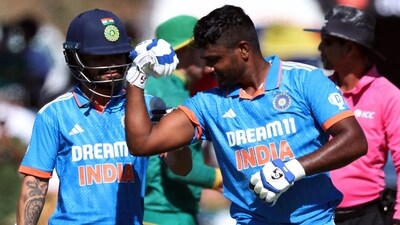 Sanju Samson flexes his muscles after scoring maiden century for India (Reuters)