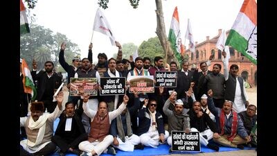 Congress and SP workers staging separate protests in Prayagraj on Friday (HT Photo)