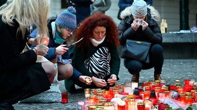Mourners place candles outside Charles University headquarters in remembrance of the victims of the tragic mass shooting in Prague. (AP) Mourners place candles outside Charles University headquarters in remembrance of the victims of the tragic mass shooting in Prague. (AP)