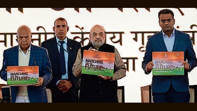 From left: UT administrator Banwarilal Purohit, Union home minister Amit Shah and mayor Anup Gupta at Chandigarh College of Engineering and Technology, Sector 26, on Friday. (Ravi Kumar/HT) From left: UT administrator Banwarilal Purohit, Union home minister Amit Shah and mayor Anup Gupta at Chandigarh College of Engineering and Technology, Sector 26, on Friday. (Ravi Kumar/HT)